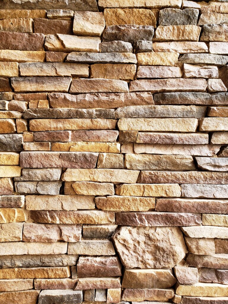 A brownish ledgestone wall panel