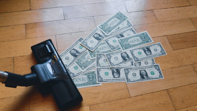Hardwood floor with money on it.