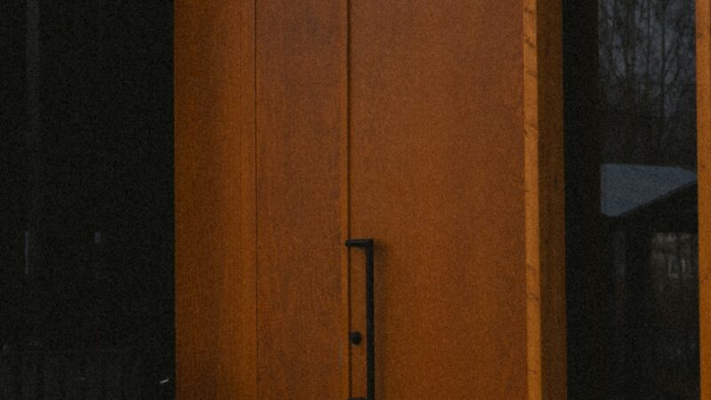 A brown steel entry door