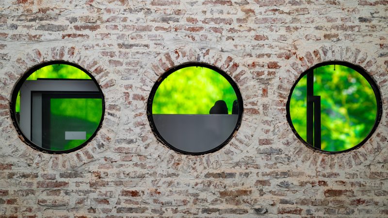 Brick wall with mirrors