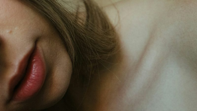 woman`s skin without wrinkles because of botox