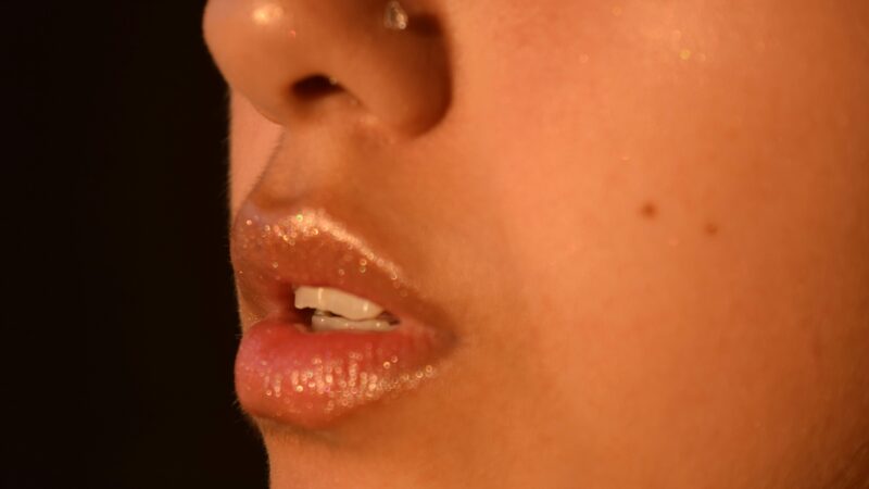 A woman with fillers in her lips